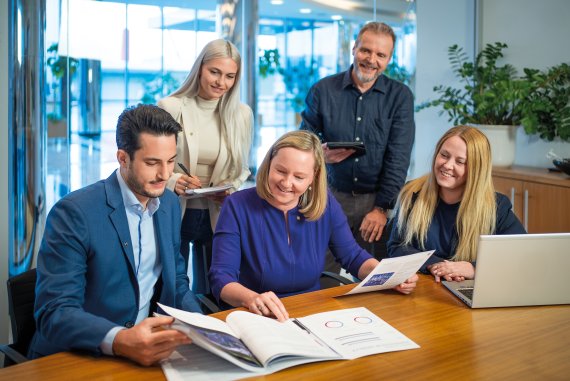 office employees at work at Novomatic