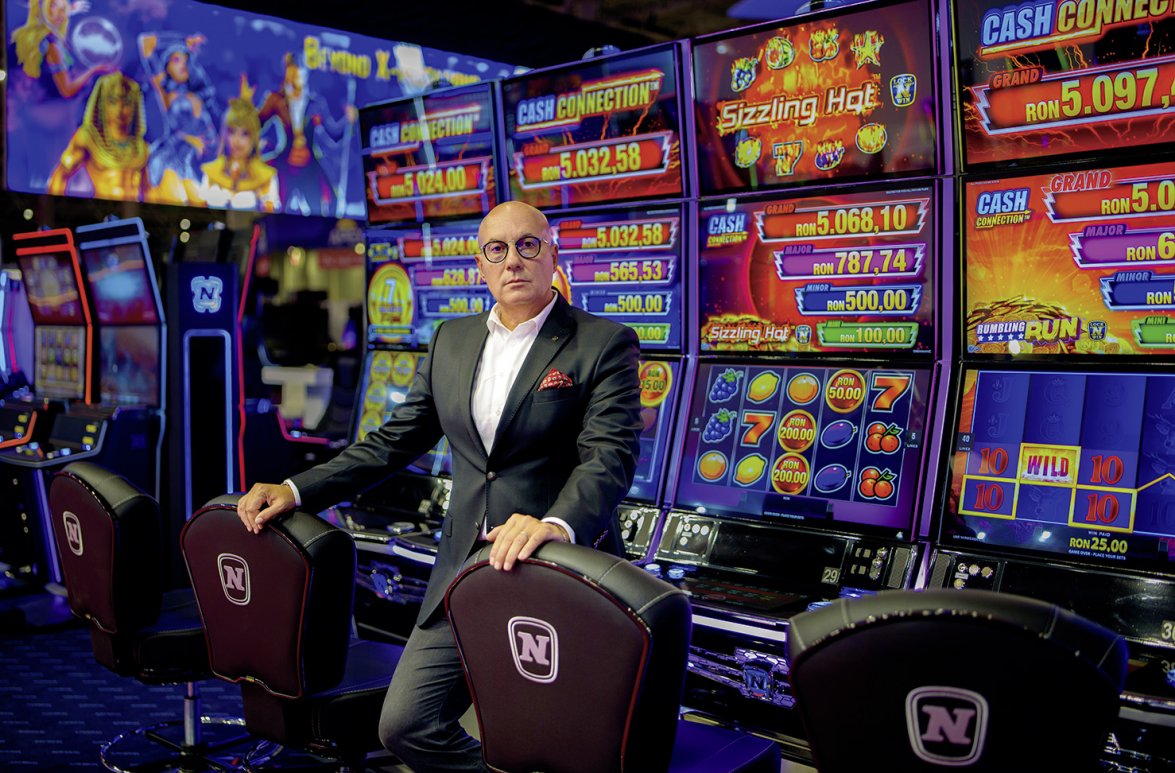Adrian Georgescu infront of gaming machines